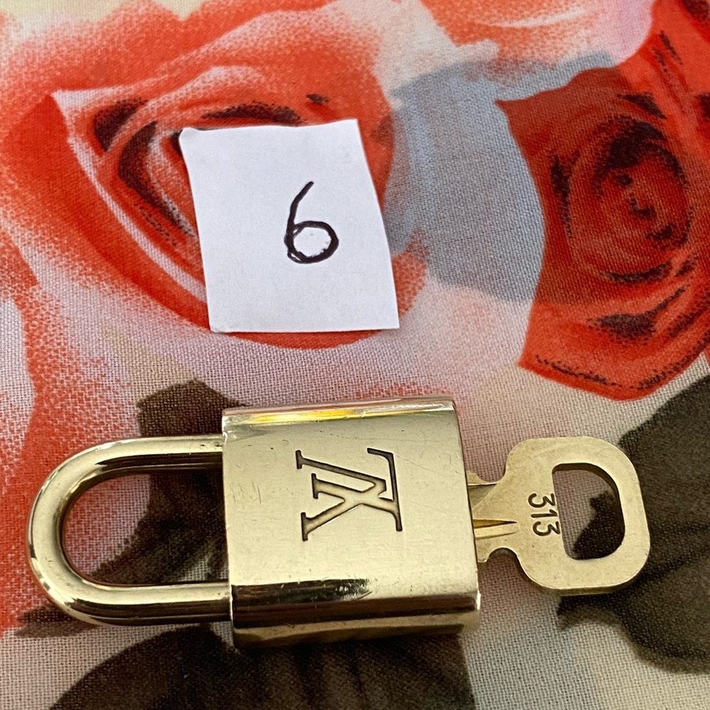 Beautiful Authentic Louis Vuitton Padlock & Key #313. Preowned in good condition